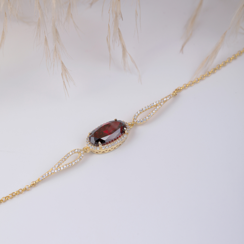 Oval Cut Garnet CZ Charm Bracelet